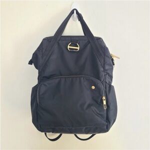 Pacsafe Black Backpack with Gold Accents